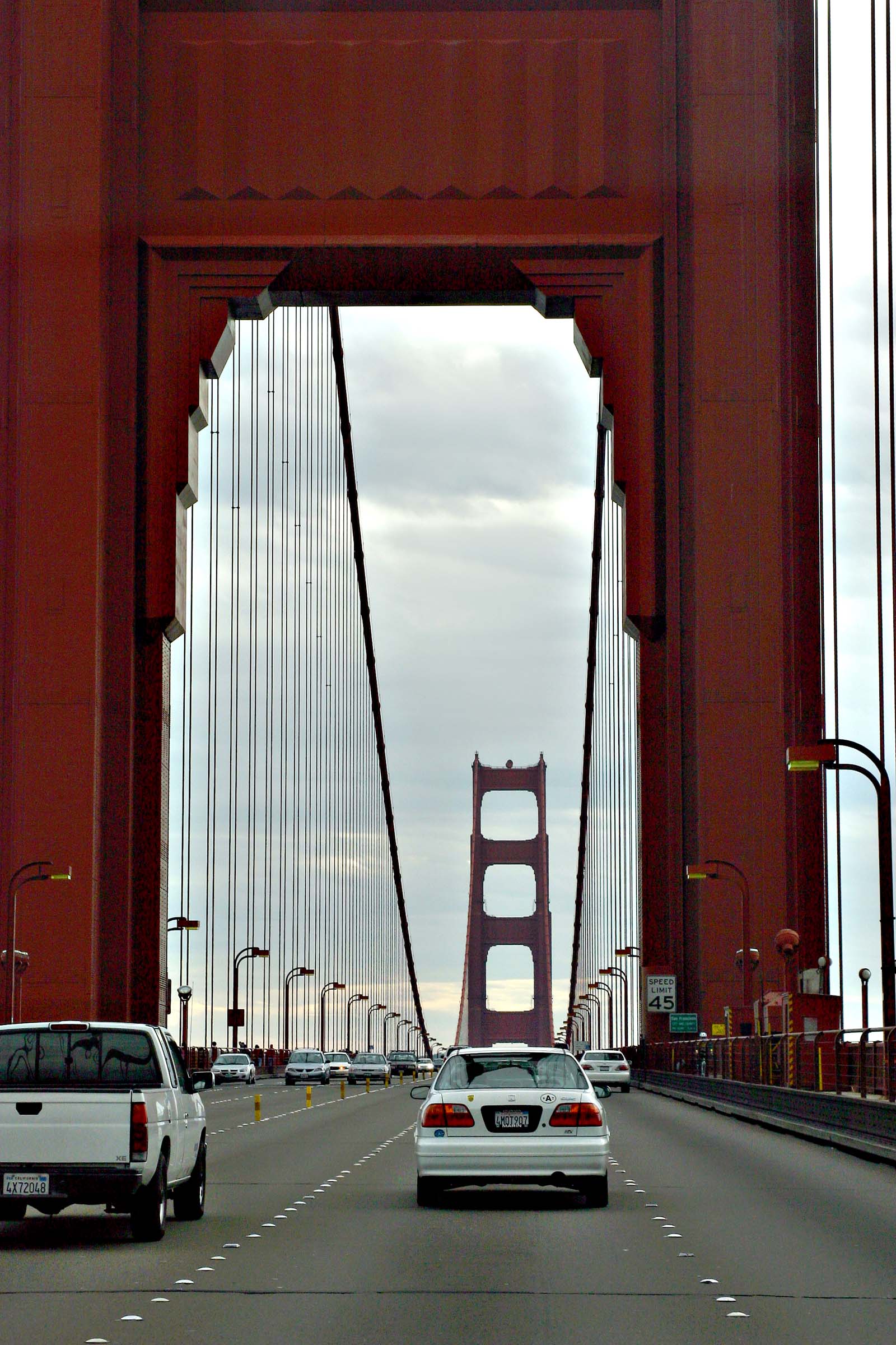 Cars driving over bridge